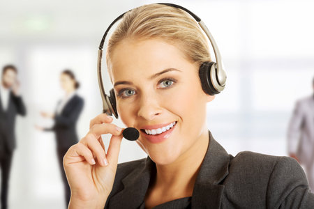 Call center woman talking to customer.の写真素材