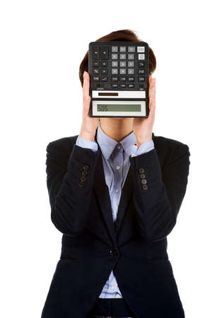Hopeless businesswoman with SOS writing on calculator.の写真素材