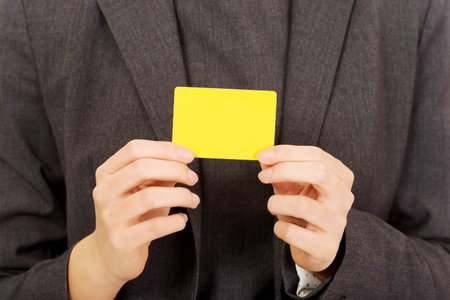 Business woman showing empty card.の写真素材