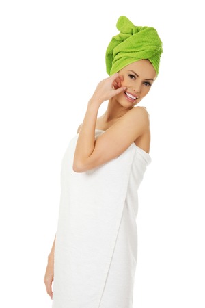 Beautiful woman with towel wrapped on head.の写真素材