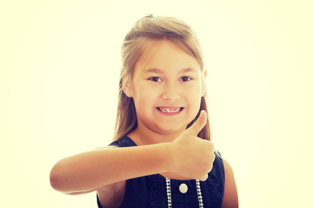 Pretty little girl thumbs up