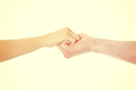 Young couple holding hands in loveの写真素材