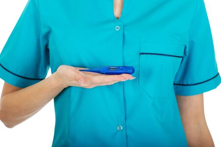 Beautiful doctor woman with a thermometer.の写真素材