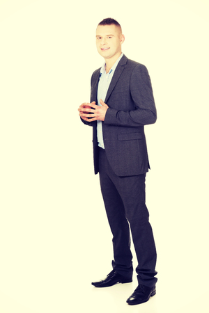 Confident young businessman with clenched hands.の写真素材