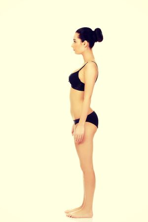 Beautiful caucasian woman standing in underwear.の写真素材