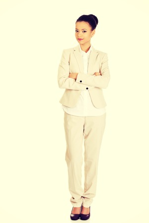 Young african business woman with arms crossed.の写真素材