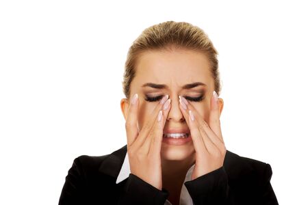 Young businesswoman with sinus ache.の写真素材