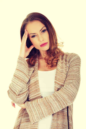 Casual depressed woman holding head.の写真素材