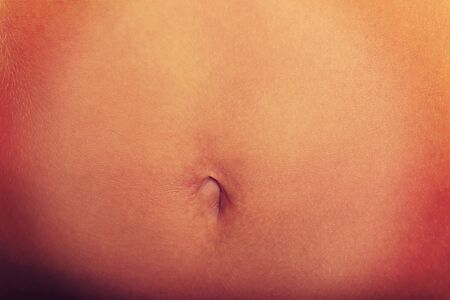 Beautiful caucasian woman's slim belly.の写真素材