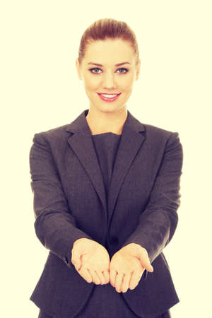 Happy businesswoman with empty hands.の写真素材