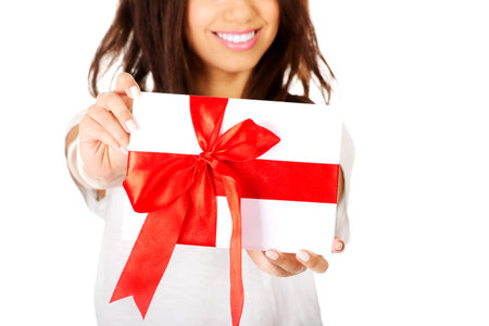 Attractive african woman with gift box.