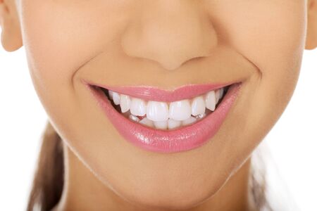 Afrian woman's mouth with perfect smile.の写真素材