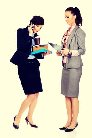 Two businesswomans discussing about their plans.の写真素材