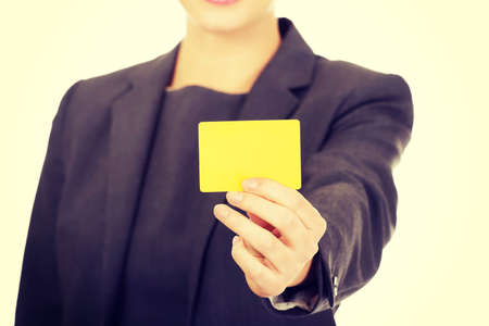 Woman's hands holding blank card.の写真素材