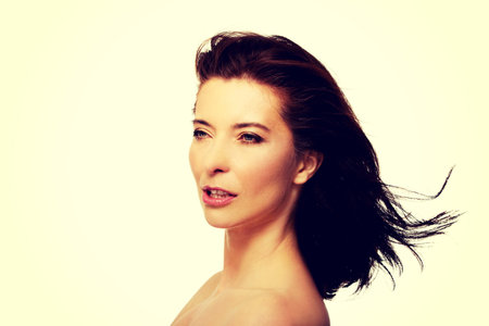 Beautiful caucasian spa woman with wind in hair.の写真素材