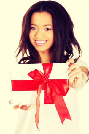 Attractive african woman with gift box.の写真素材