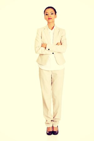 Young african business woman with arms crossed.の写真素材