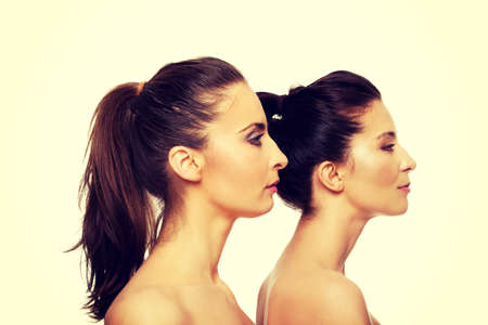 Two attractive sisters with make up.の写真素材