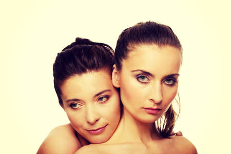 Two attractive sisters with make up.の写真素材