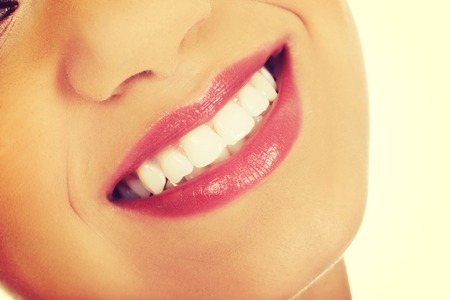 Afrian woman's mouth with perfect smile.の写真素材