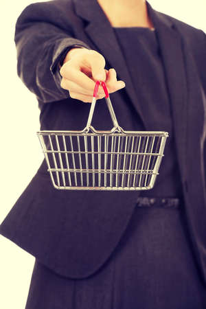 Attractive businesswoman with shopping cart.の写真素材