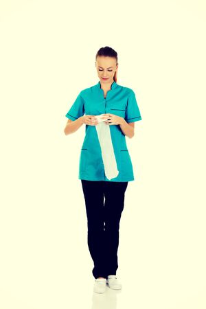 Beautiful doctor woman with a bandage.の写真素材