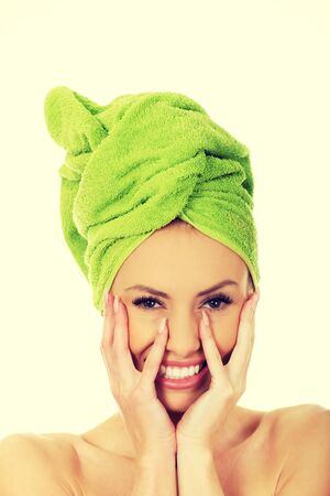 Beautiful woman with towel wrapped on head.の写真素材