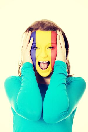 Woman with Andora flag painted on her face.の写真素材