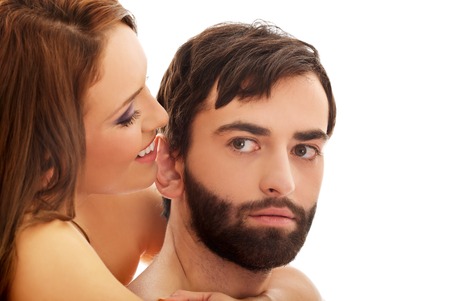 Beautiful passionate shirtless couple embracing.の写真素材