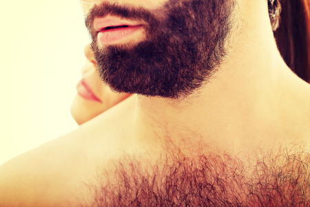 Beautiful woman with her head on man's back.の写真素材