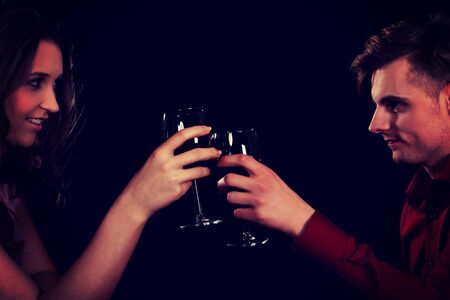 Couple on a date drinking wine.の写真素材