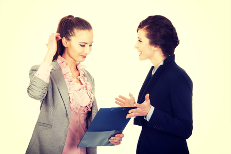 Angry businesswoman disagree with her friend idea.の写真素材