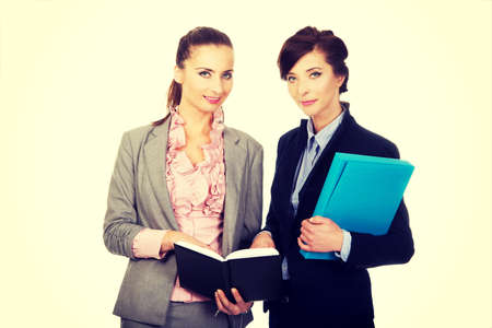 Two businesswomans discussing about their plans.の写真素材