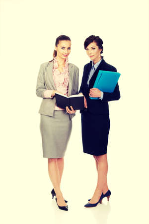 Two businesswomans discussing about their plans.の写真素材