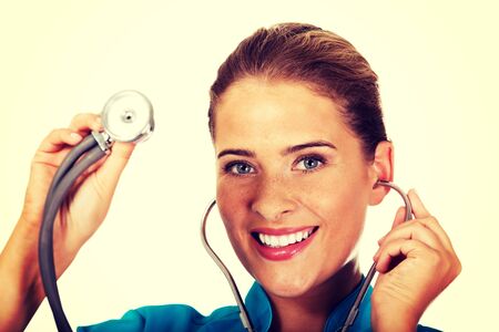 Young female doctor or nurse with stethocope.の写真素材