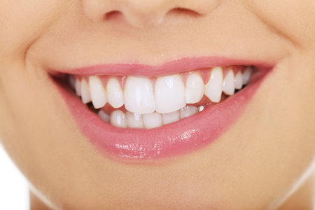 Beautiful young woman toothy smile.