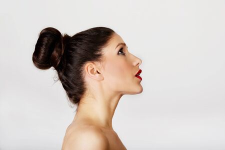 Attractive brunette topless woman with dark make up.の写真素材