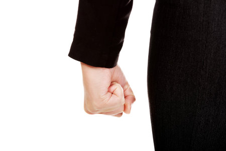 Back view of businessw woman clamped fist.の写真素材
