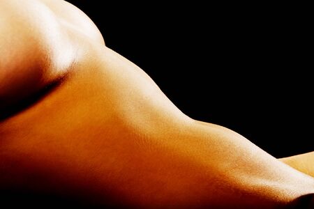 Perfect slim naked body of young woman.の写真素材