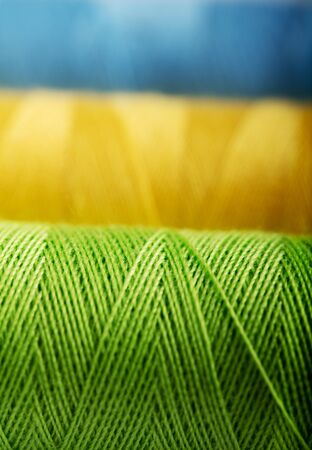 Background of colorful sewing threads.の写真素材
