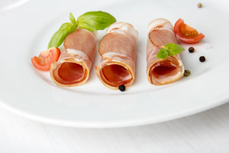 Black forest ham on white plate.の写真素材