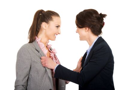 Two angry businesswomans arguing with eachother.の写真素材