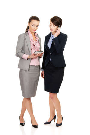 Two businesswomans discussing about their plans.の写真素材