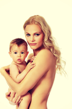 Young mother with her adorable baby.の写真素材