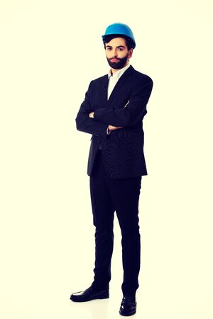 Smiling handsome businessman with hard hat.の写真素材