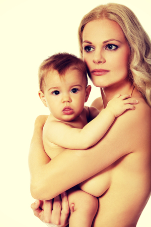 Young mother with her adorable baby.の写真素材