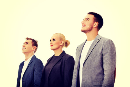 Business people team standing and looking away together.の写真素材