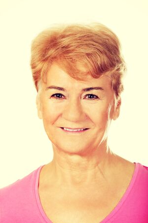 An old smiling charming woman.の写真素材