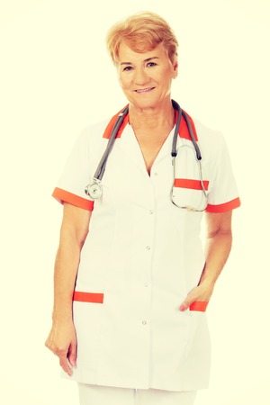 Smile elderly female doctor with stethoscope.の写真素材