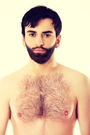 Handsome shirtless man smiling to camera.の写真素材